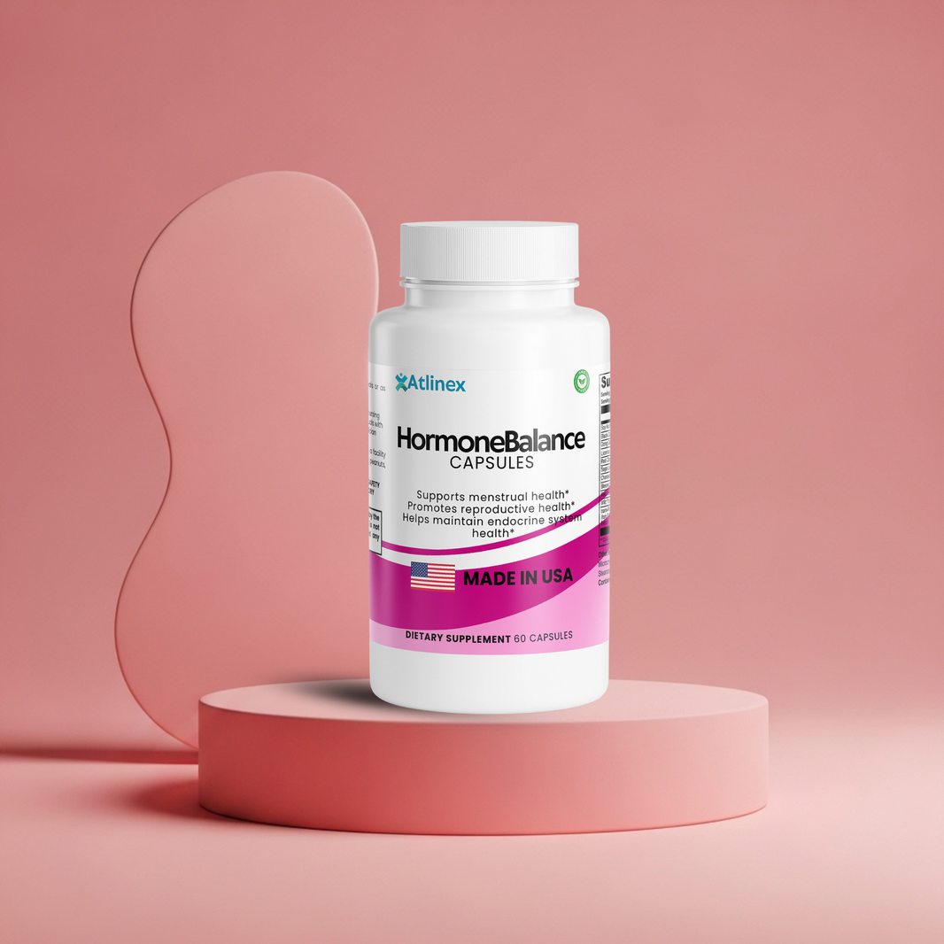 Supplement bottle labeled 'HormoneBalance' on a pink platform with a pink background